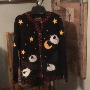 100% multicolor wool sweater. Dry clean only.